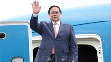 Thủ tướng Phạm Minh Chính tới Trung Quốc bắt đầu tham dự Hội nghị WEF Đại Liên 